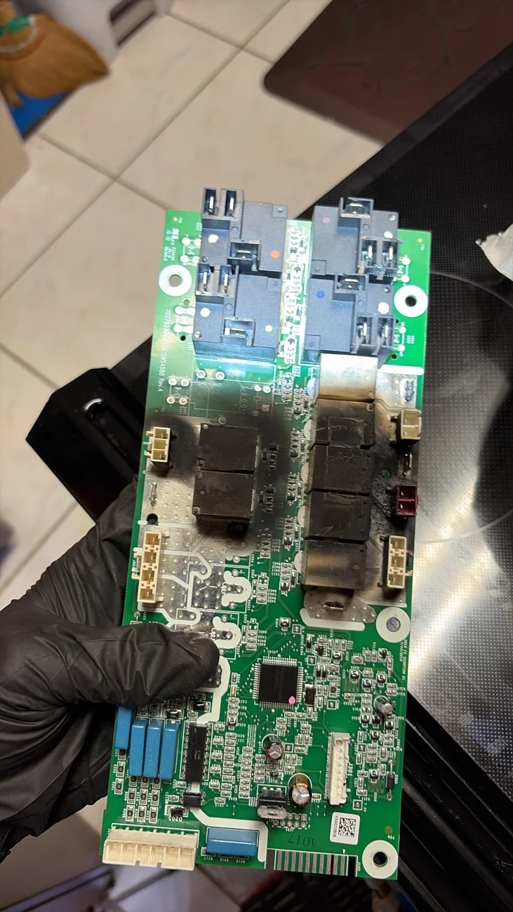 Appliance control-board inspection.